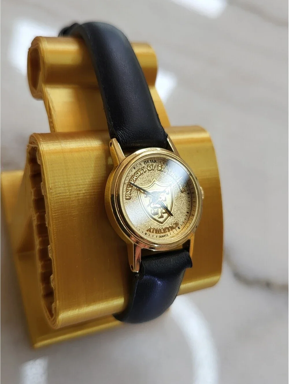 Athletics St. Thomas University GoldTone BlackLeather Womens Watch EUC 18mm 7.25